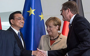 Li Keqiang (Premier de China), Martin Winterkorn (CEO de VW) y Angela Merkel (canciller de Alemania)
